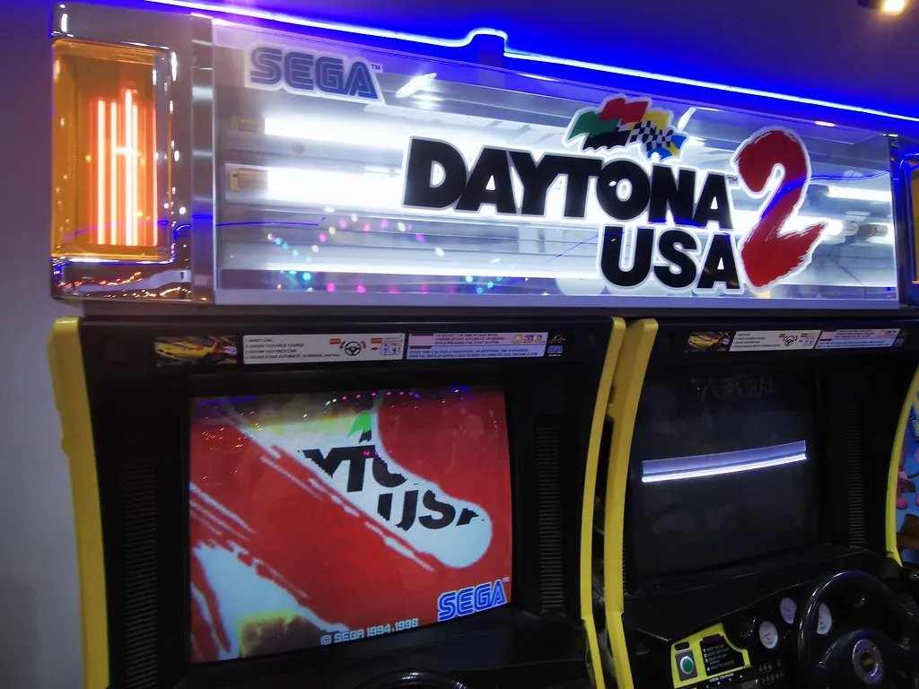 Arcade cabinet glowing in a game room